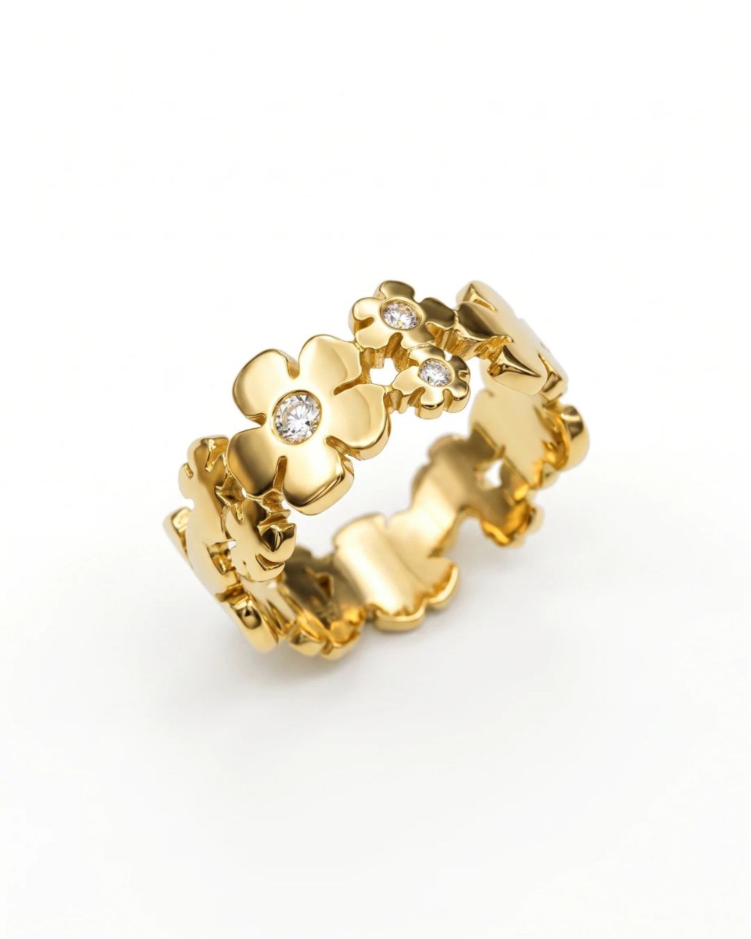 Gold flower eternity ring with diamonds.