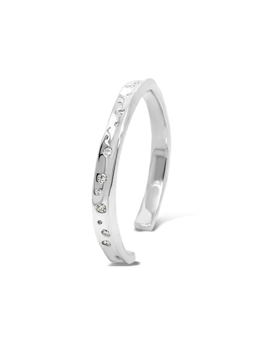 Handmade solid silver bangle with hammered texture and scattered diamond accents