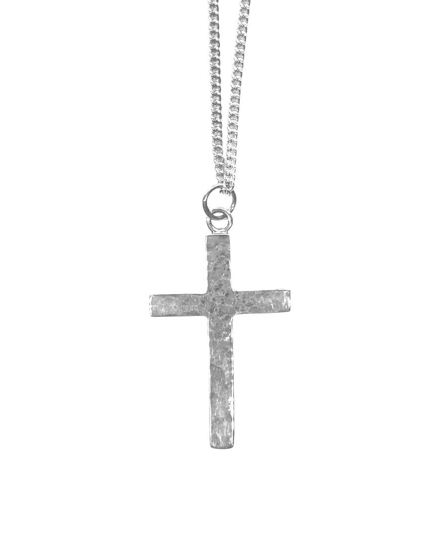 Forged solid silver cross pendant with straight sides and bail on a silver chain.