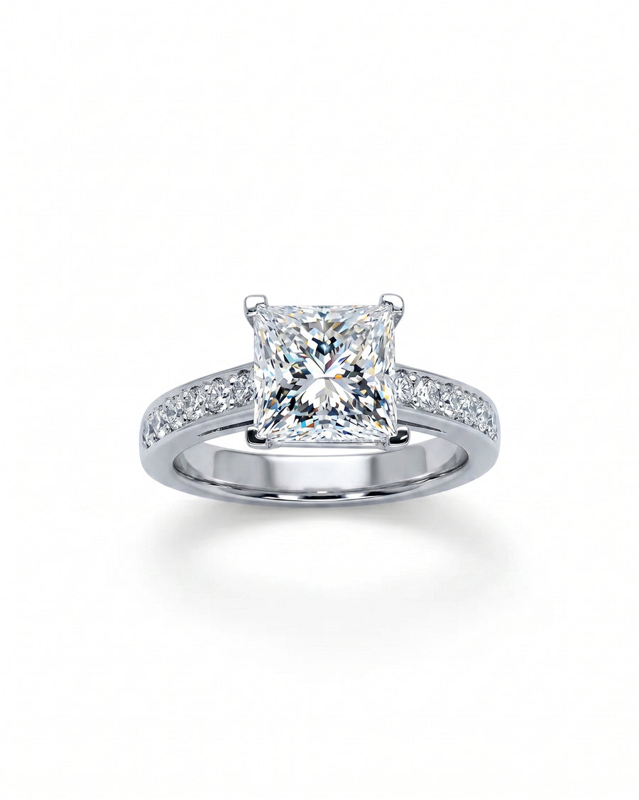 Silver four claw pavé set princess cut diamond engagement ring.