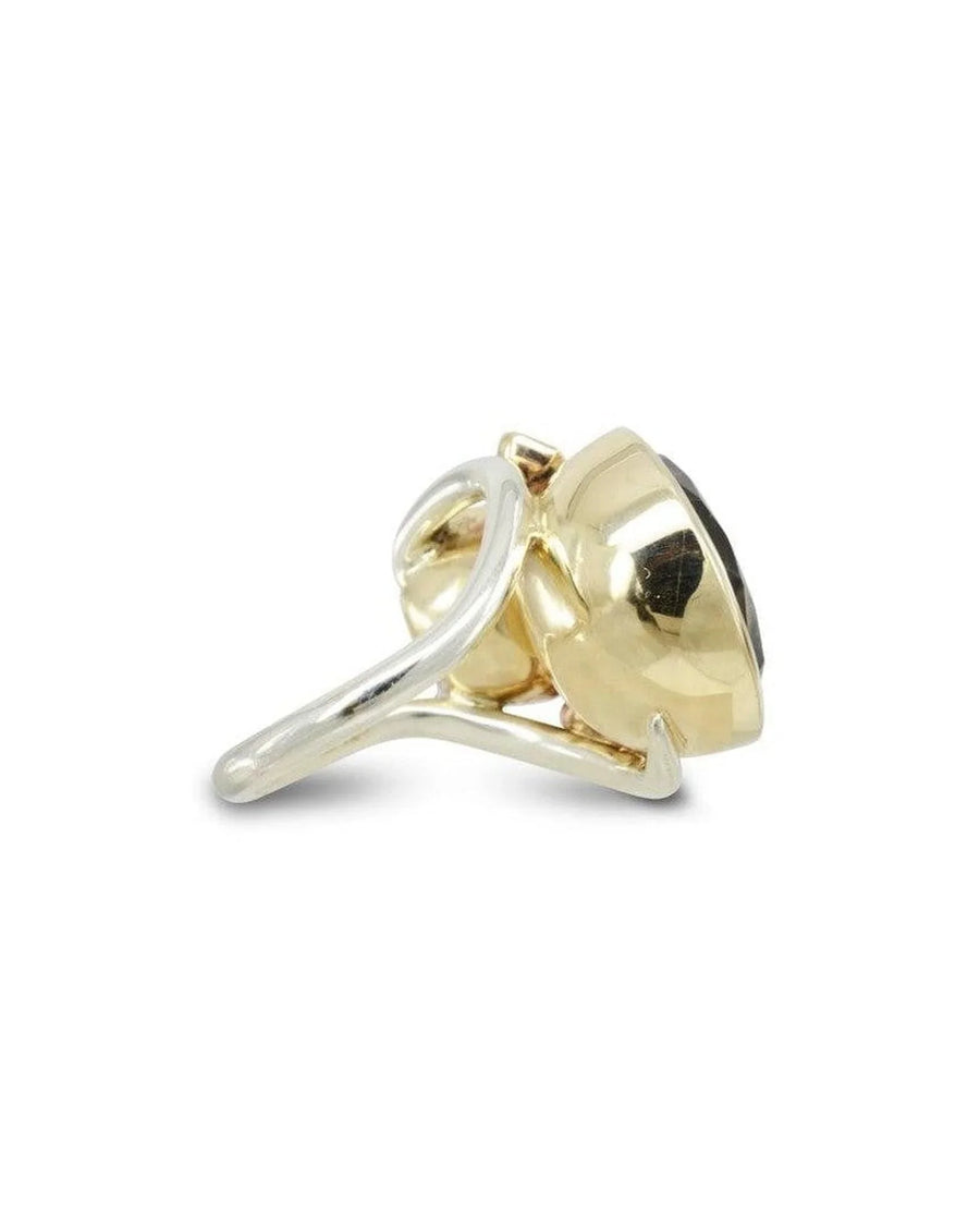 Garnet cocktail ring set with 9ct white gold band, side view on white background