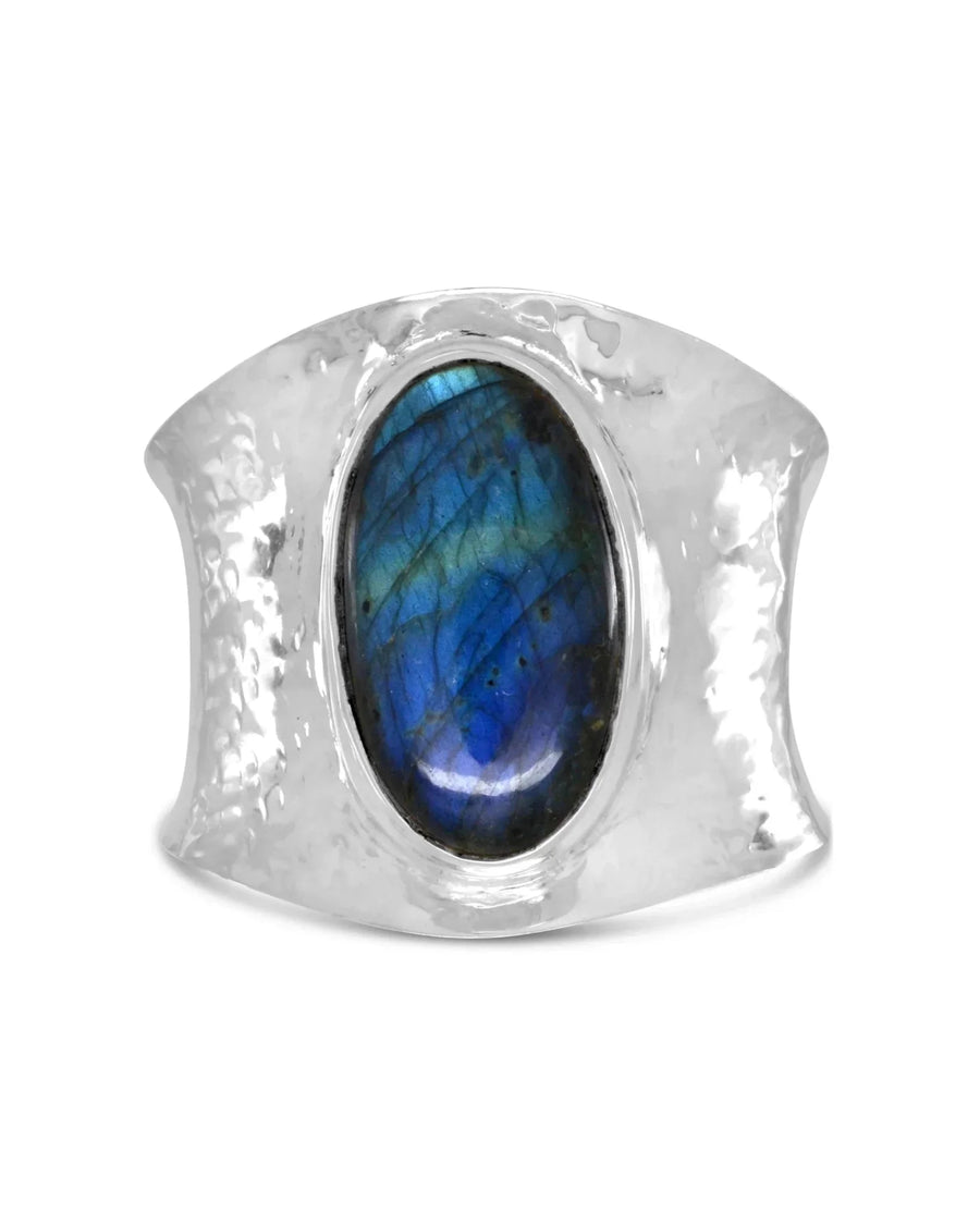 Hammered silver cuff bangle with an oval labradorite gemstone.
