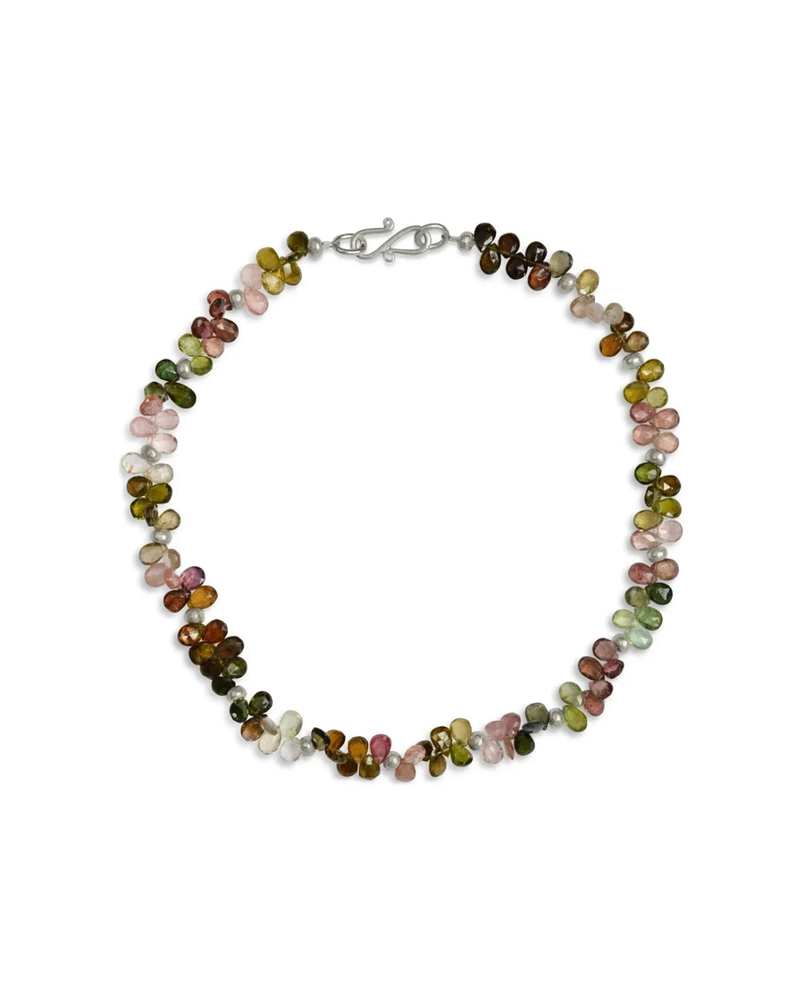 Handmade teardrop gemstone necklace with multicolored stones and silver clasp on white