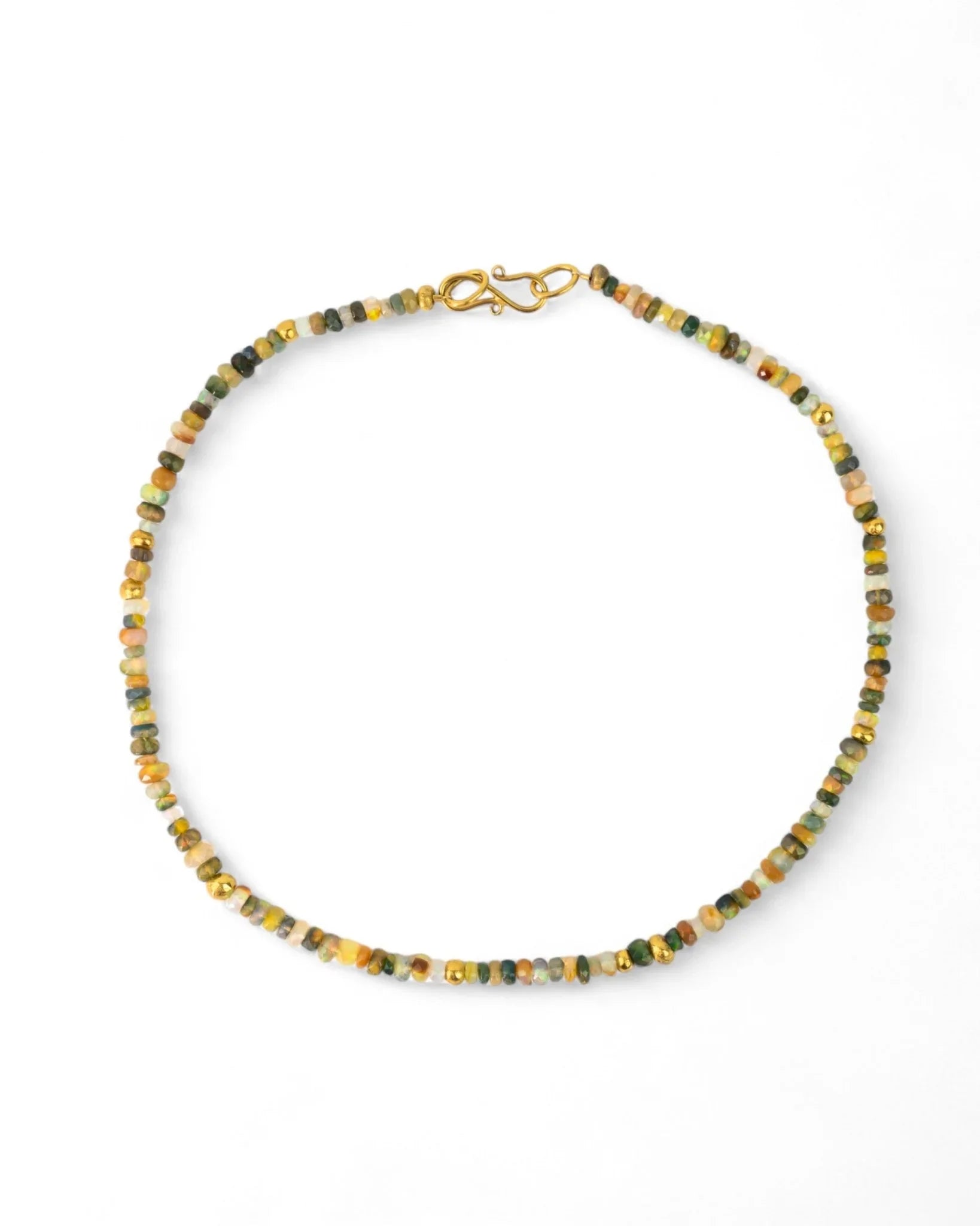 Handmade gold nugget and opal bead necklace with a gold clasp, elegant and organic design