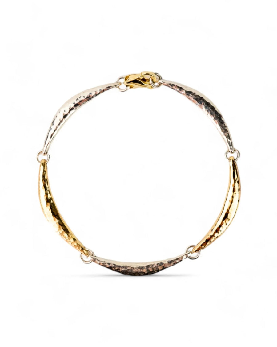 Handmade hammered silver and gold crescent bracelet with organic textured links