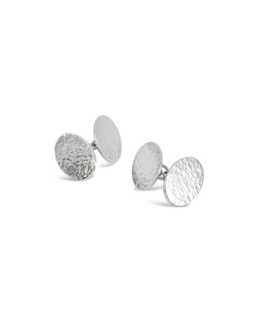 Oval silver cufflinks with a textured hammered finish on a white background.