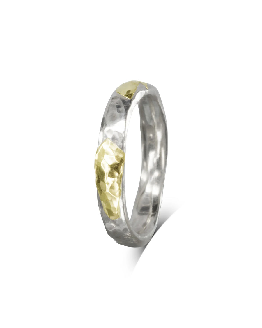 Hammered mixed metal court ring in silver with gold accents.