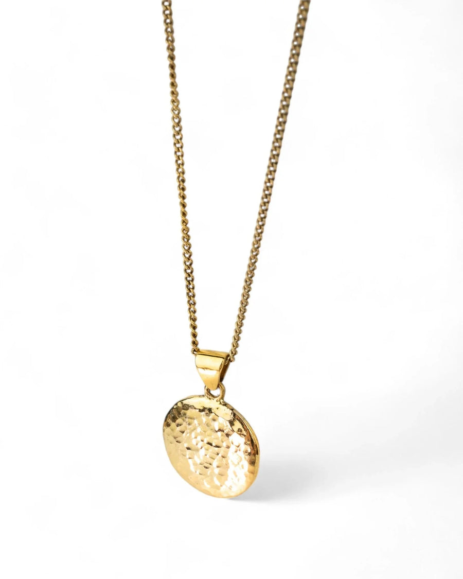 Handmade hammered 9ct yellow gold coin pendant on a gold chain, minimalist jewelry