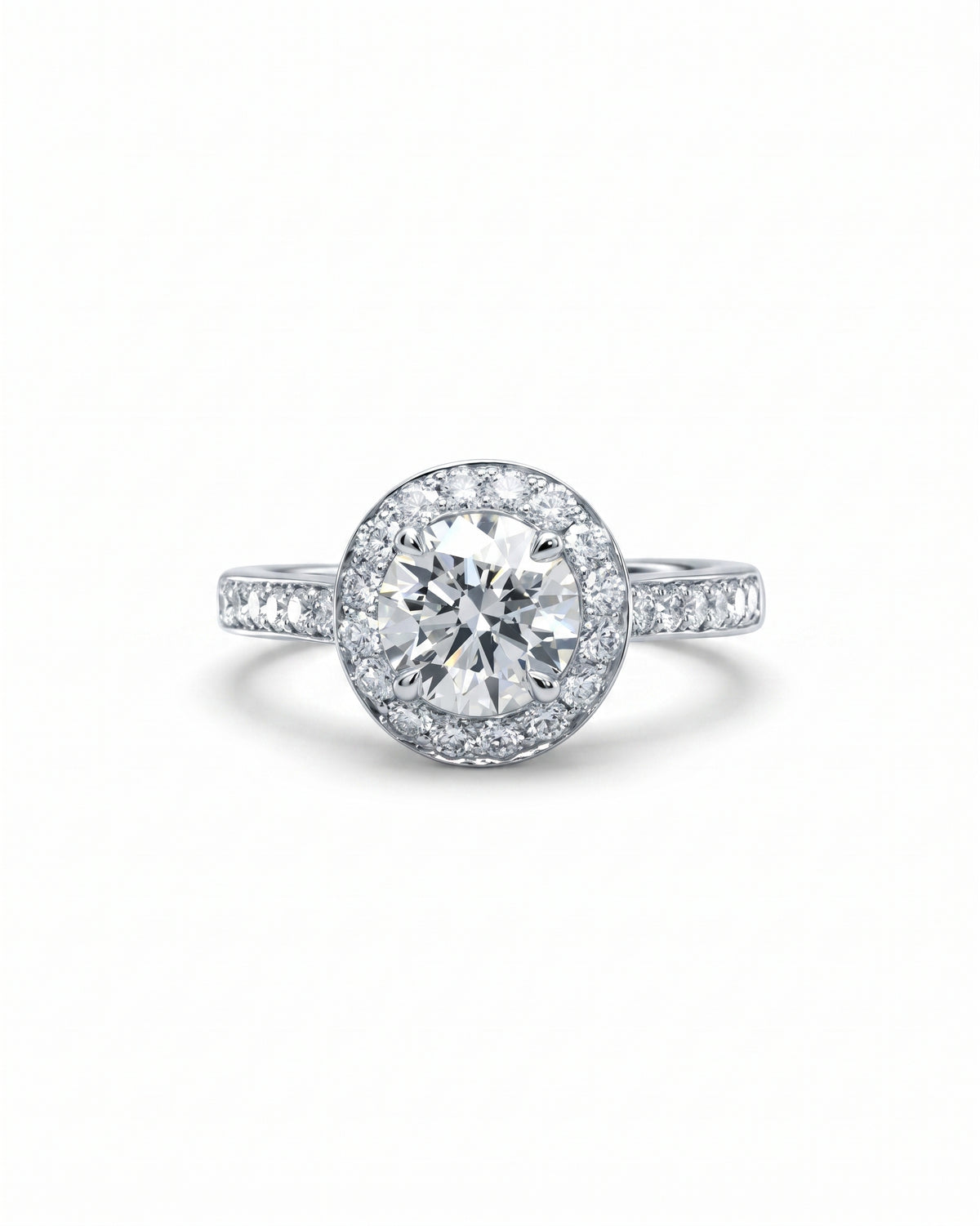 Silver engagement ring with a round diamond cluster and pavé band.