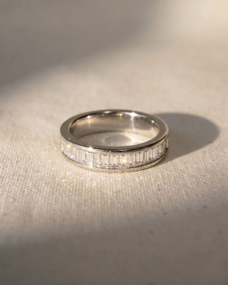Platinum eternity ring with hinged baguette diamonds.