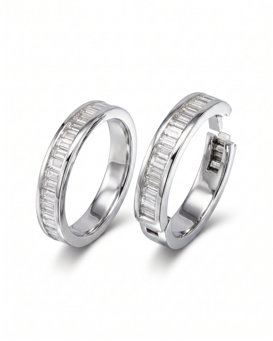 Platinum hinged baguette diamond eternity ring.