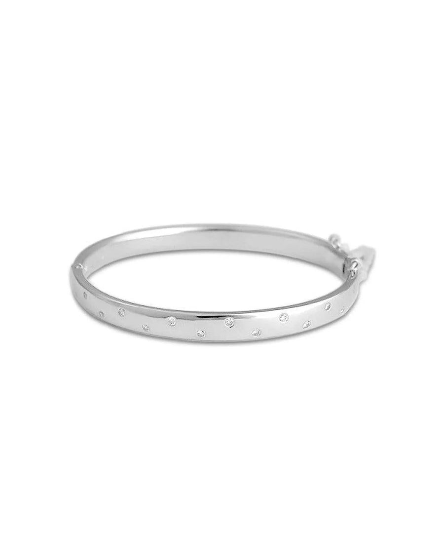 Hinged solid silver bangle with scattered diamonds and a zig-zag design on one side.