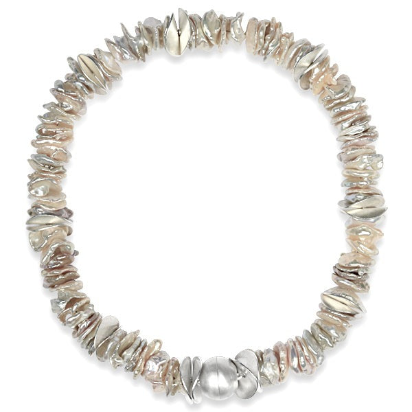 Keshi pearl and silver disc necklace with a silver clasp.