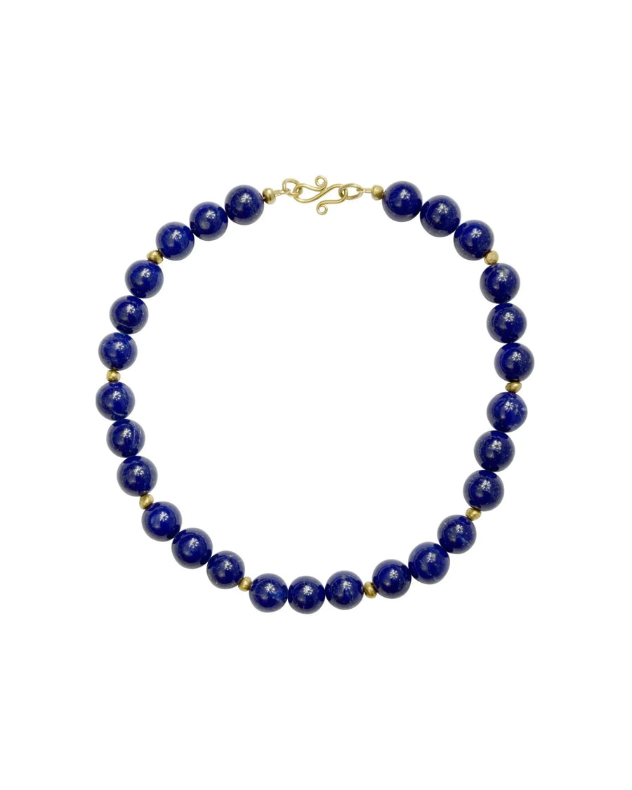 Lapis lazuli beaded necklace with gold nugget accents and a gold hook clasp.
