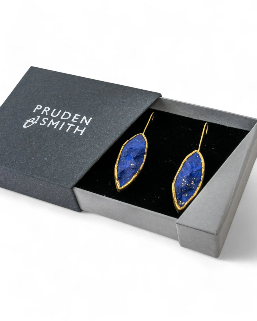 Lapis lazuli marquise drop earrings with gold edging in a jewelry gift box
