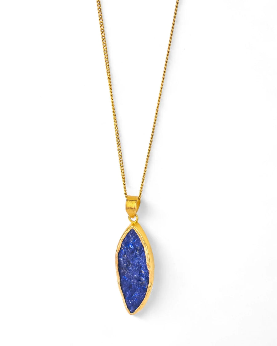 Gold necklace with a marquise-shaped lapis lazuli pendant on white background