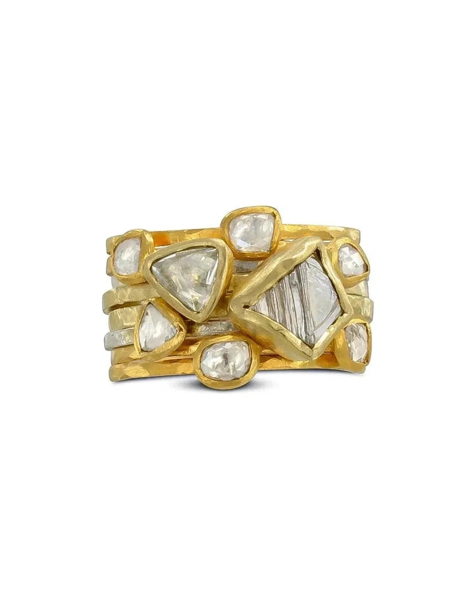stacked gold rings with rough cut diamonds and organic shapes