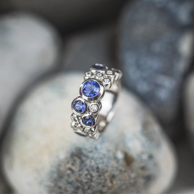 Sapphire and diamonds eternity ring