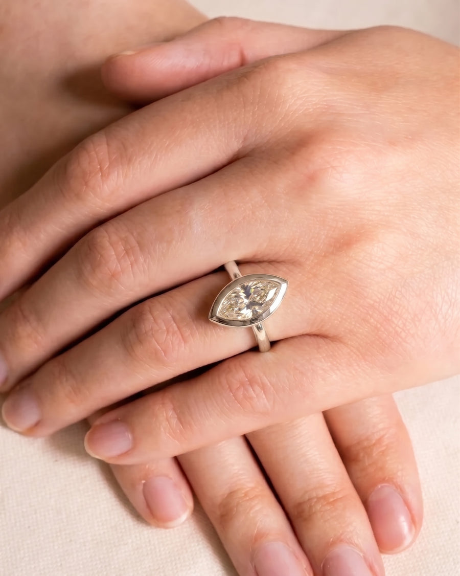 Marquise Cut Bezel Cathedral Engagement Ring
