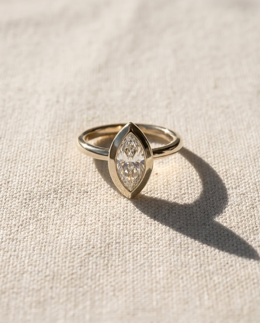Marquise Cut Bezel Cathedral Engagement Ring