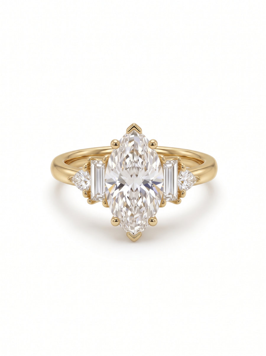 9ct yellow gold engagement ring featuring a marquise cut center stone with baguette and trillion side diamonds.