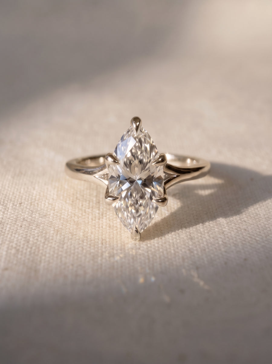 Marquise Cut Tulip Claw Engagement Ring