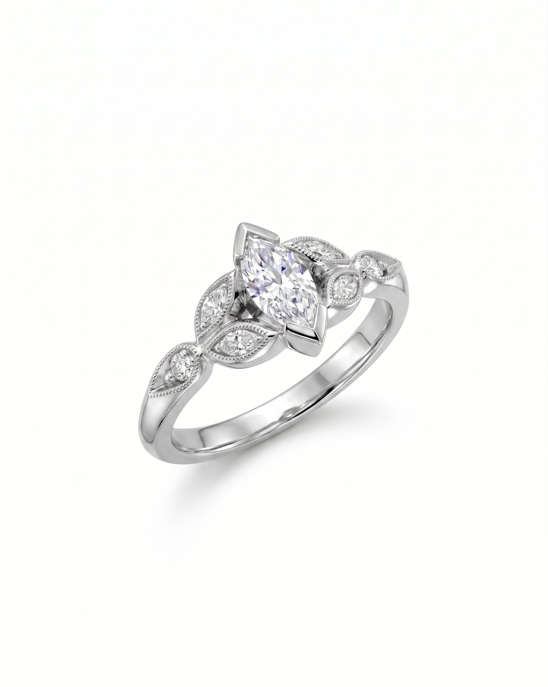 White gold marquise cut vintage engagement ring with diamond accents.