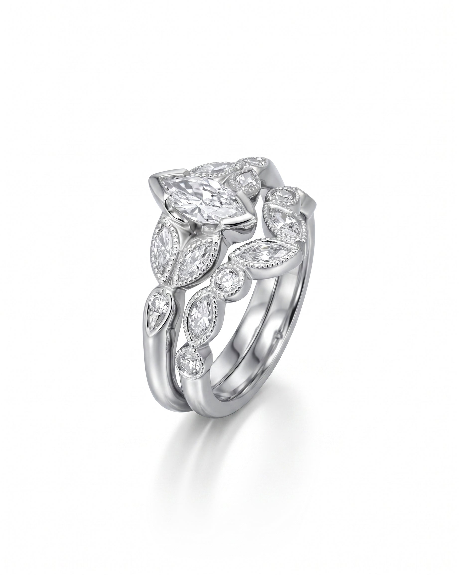 Silver marquise diamond beaded wedding and engagement ring set.