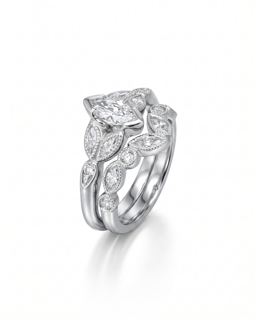 Silver marquise diamond beaded wedding and engagement ring set.