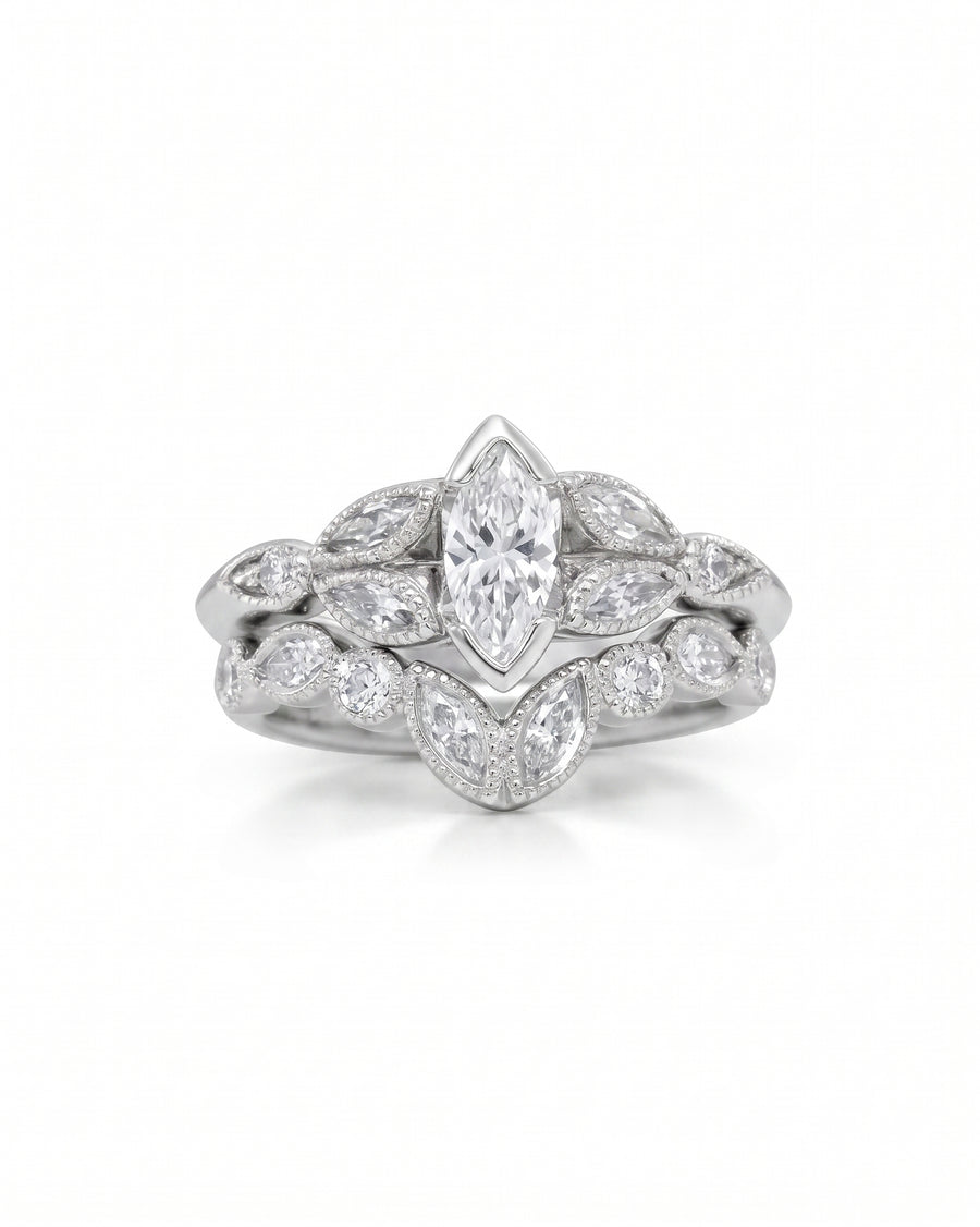 Silver marquise diamond beaded wedding and engagement ring set.