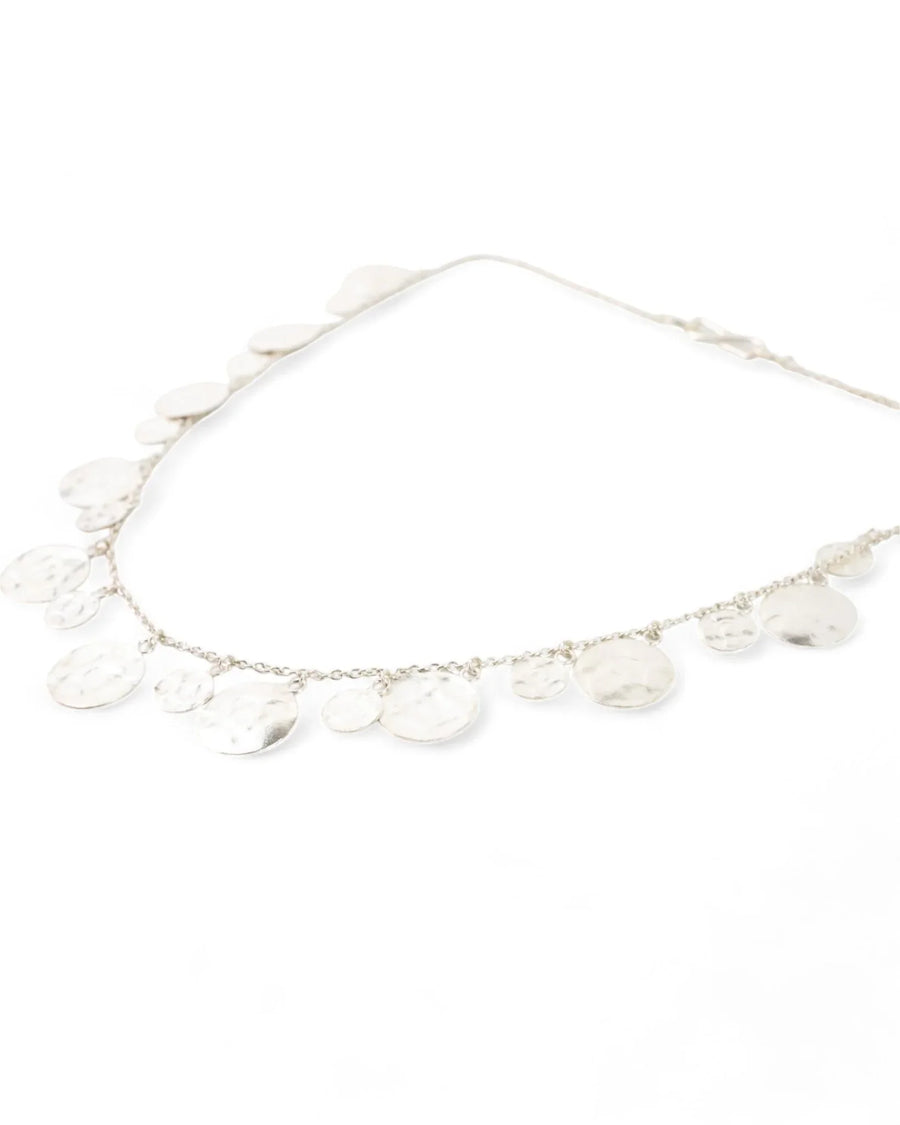Handmade hammered silver necklace with round disc charms on a delicate chain
