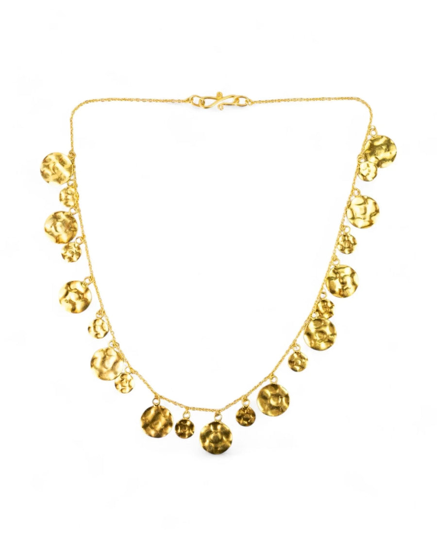 Hammered round yellow gold necklace with organic textured discs on a delicate chain