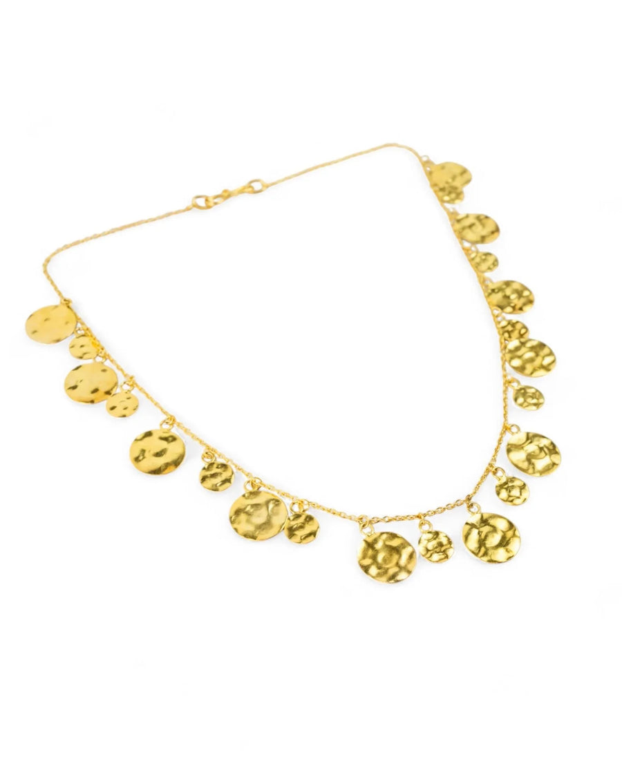 Handmade hammered yellow gold round disc necklace with organic textured finish