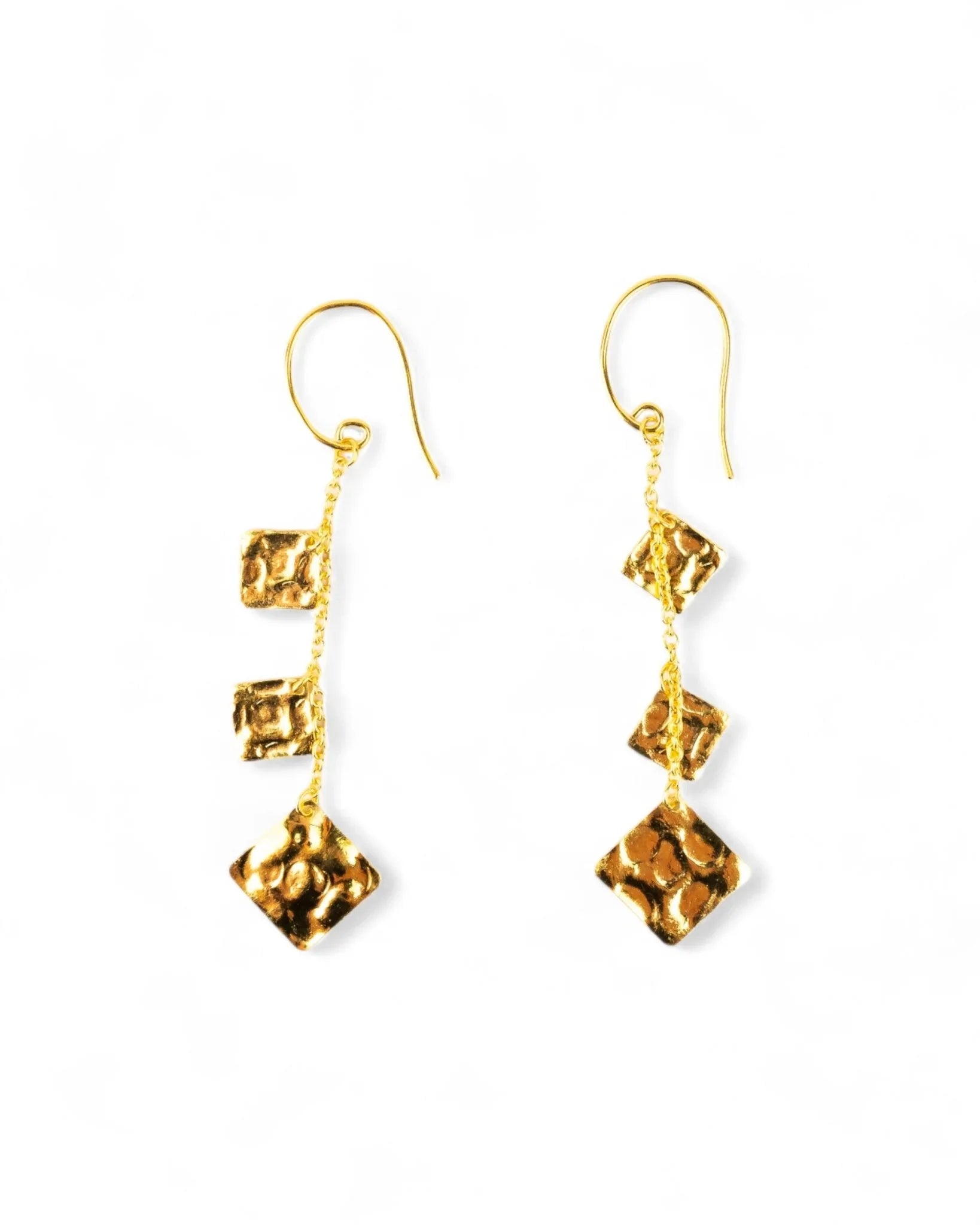 Gold hammered square dangly earrings with three textured squares on a chain.