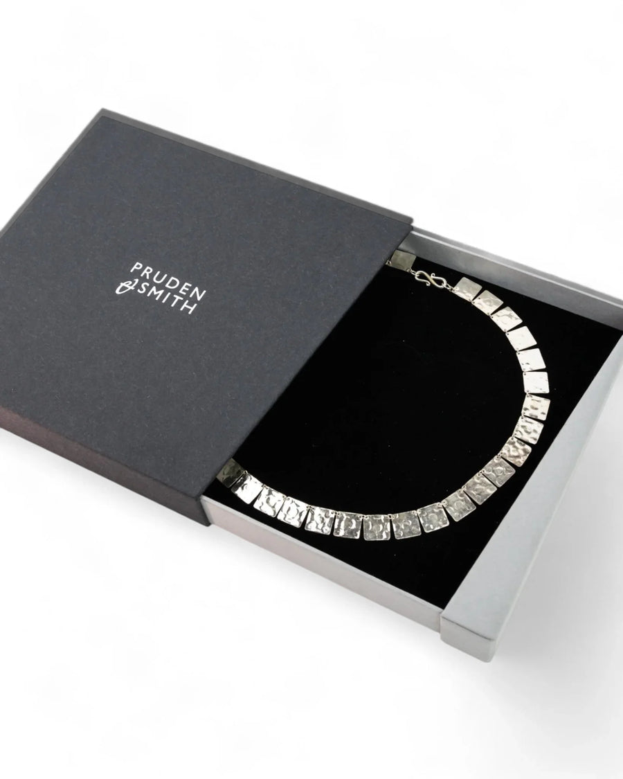 Handmade hammered square silver necklace with textured finish in a luxury gift box