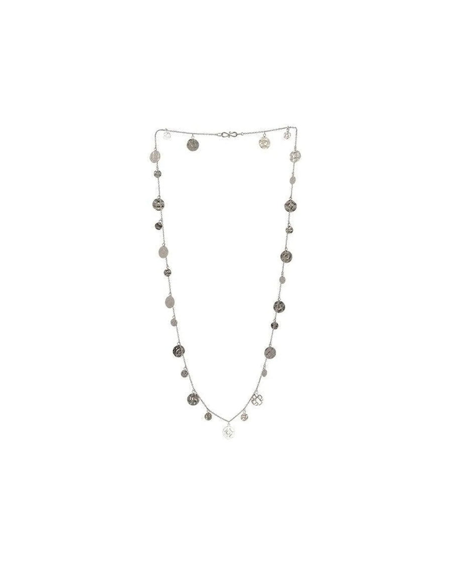 Long silver necklace with hammered coin charms on a delicate chain, minimalist jewelry