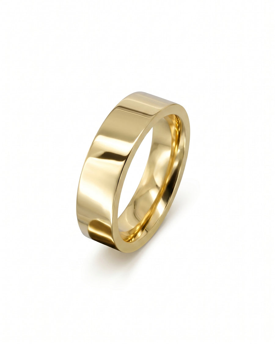 Gold flat wedding band.