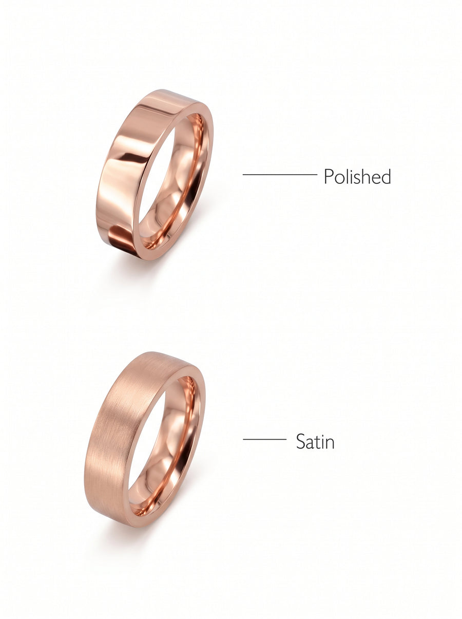Two rose gold flat wedding rings, one with a polished finish and one with a satin finish.