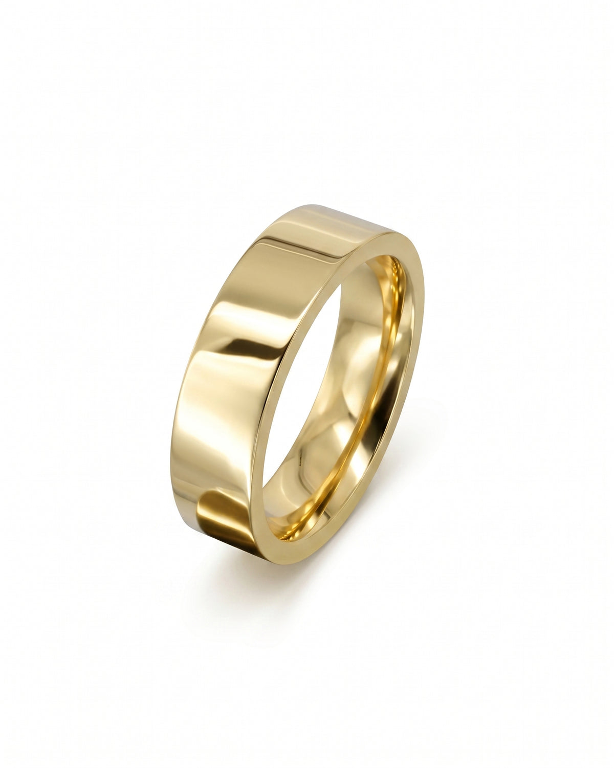 Polished yellow gold wedding ring with a flat band design isolated on a white background.