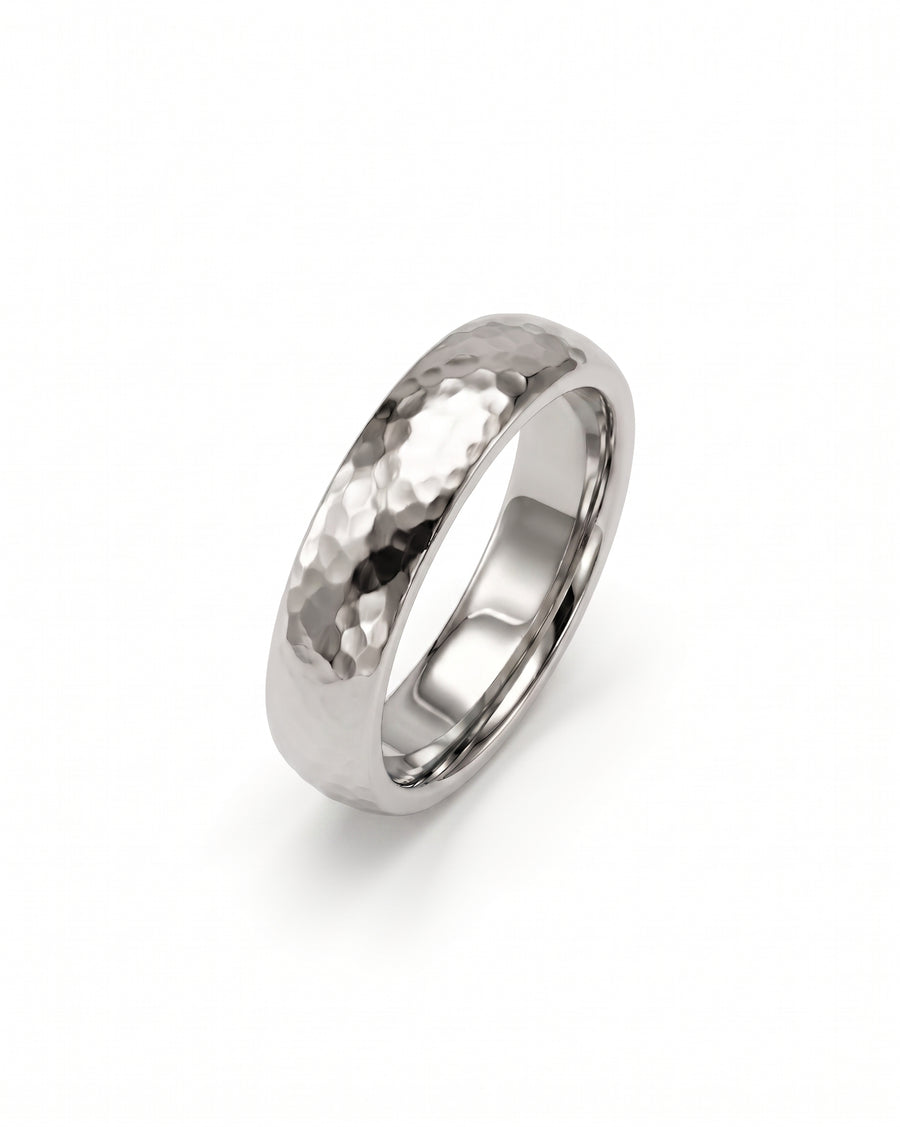 4mm 9ct white gold wedding ring with a hammered texture and a smooth court profile.