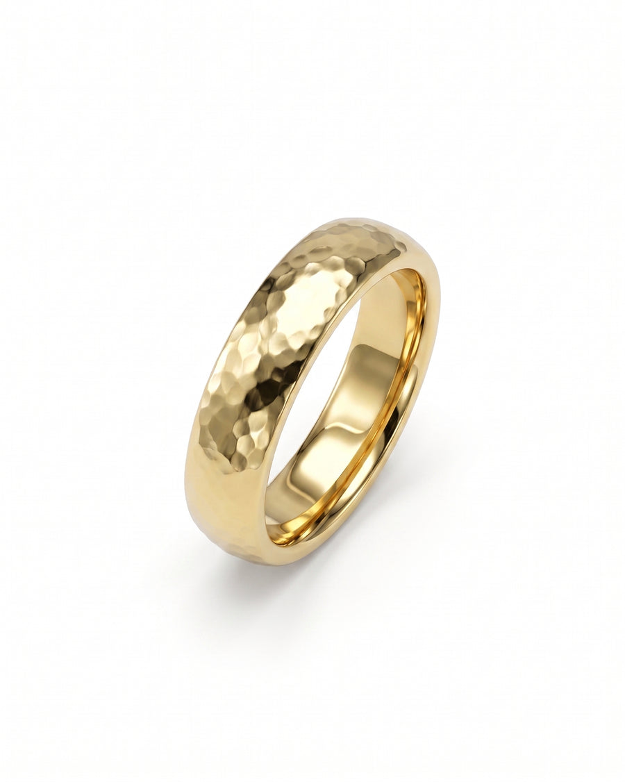 4mm 9ct yellow gold court wedding ring with a textured hammered finish.