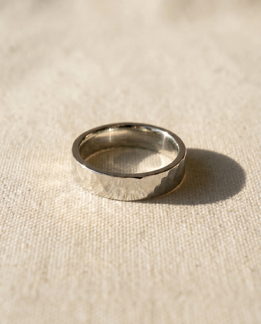 9ct white gold hammered wedding ring, 4mm, polished finish.
