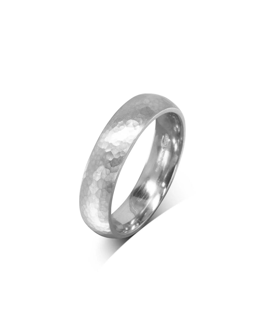 Men's matt hammered court wedding ring in silver.