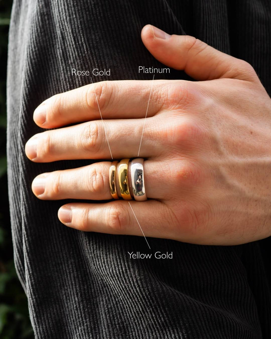 Men's matt hammered court wedding rings in rose gold, yellow gold, and platinum.
