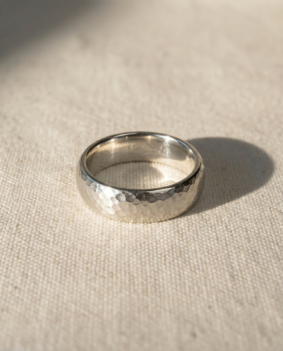 9ct white gold 4mm matt hammered court wedding ring.