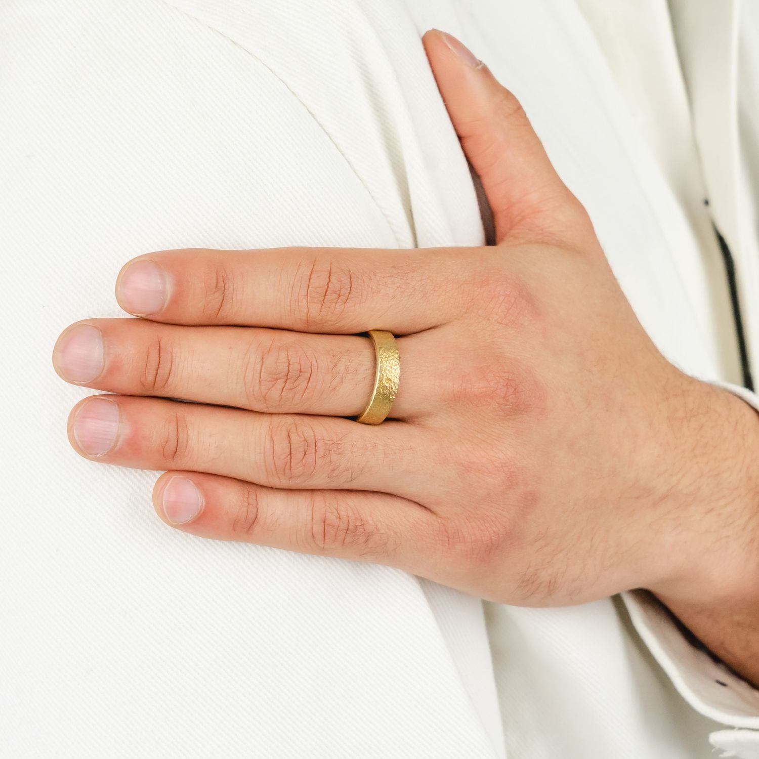 mens wedding ring on model by pruden and smith