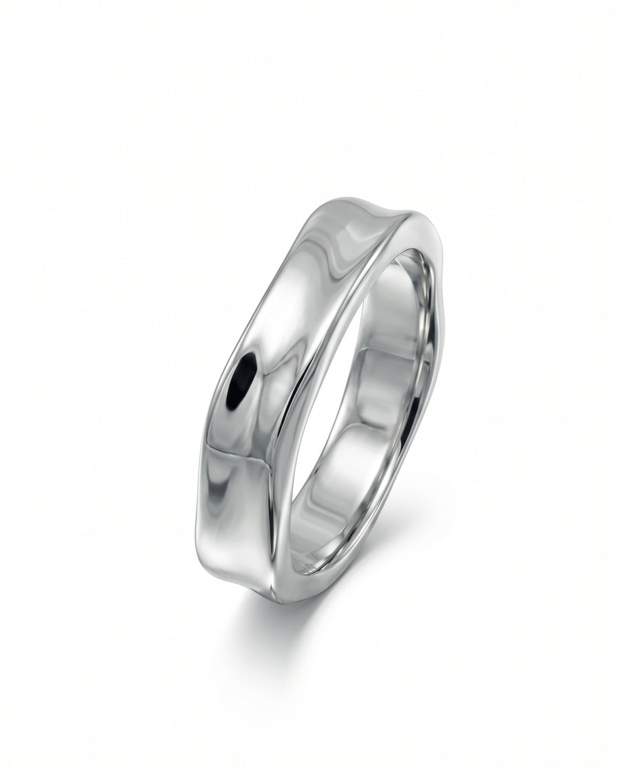 Polished silver men's wedding ring with a smooth, organic wavy edge design on a white background.