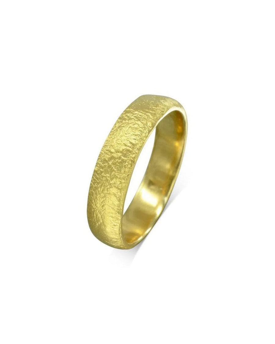 Textured gold ring with a matte finish, handmade artisan jewellery on white background