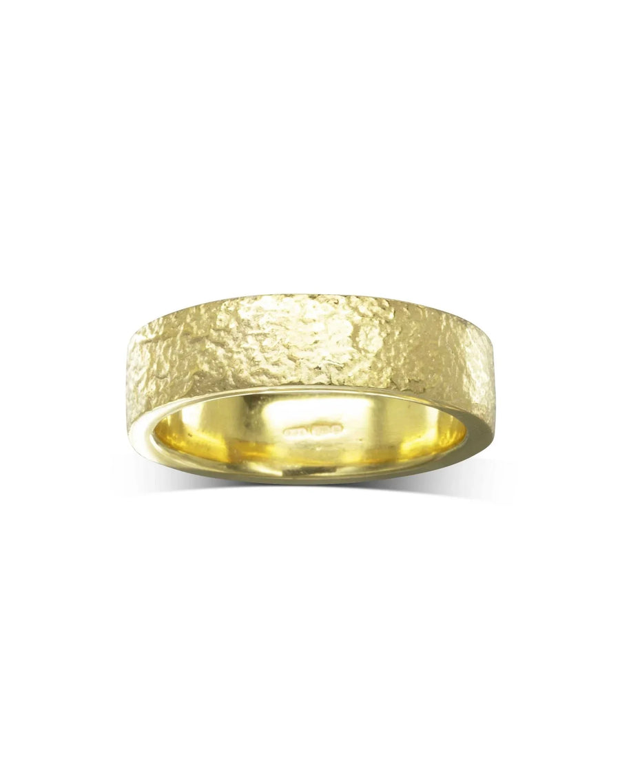 Textured flat yellow gold wedding ring with a hammered finish, 6mm wide