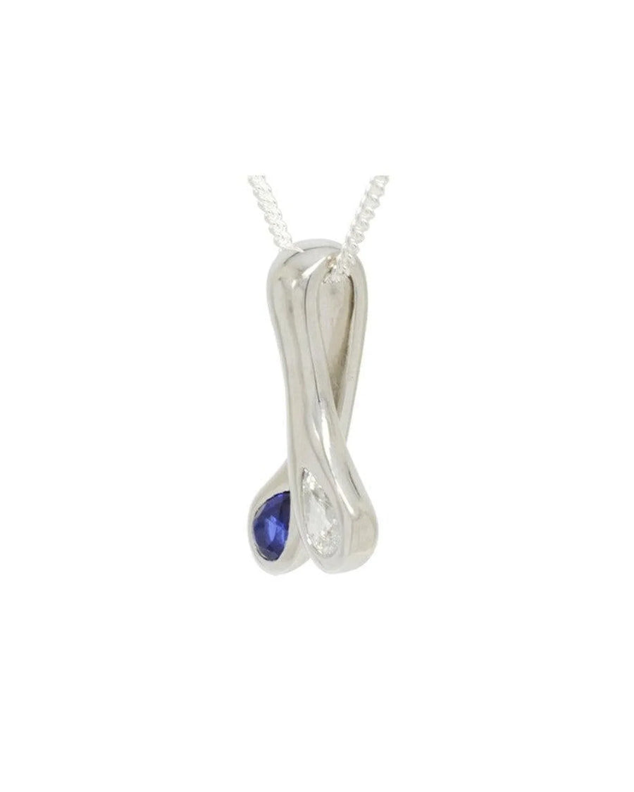 white gold pendant with sapphire and diamond gemstones on a fine chain
